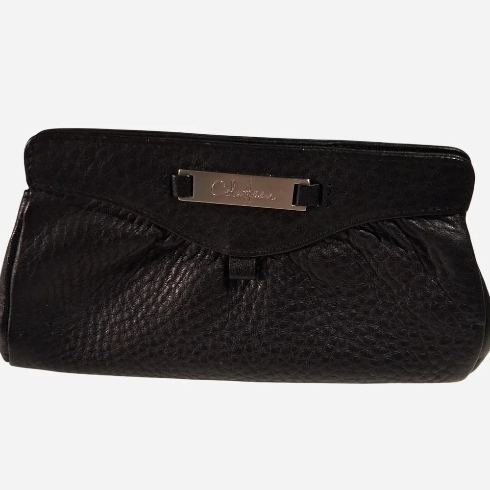 Womens Black leather clutch with textured pebbled finish great for make up